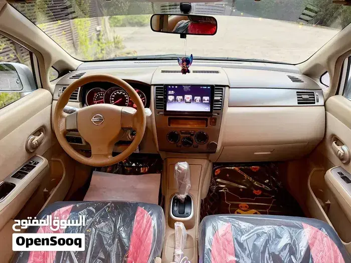Nissan Tiida 2012 photo 4