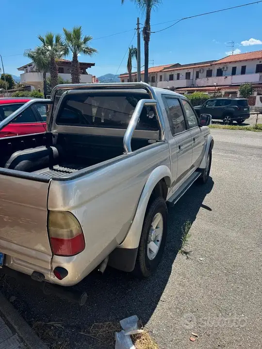 Mitsubishi L200 2003 photo 2