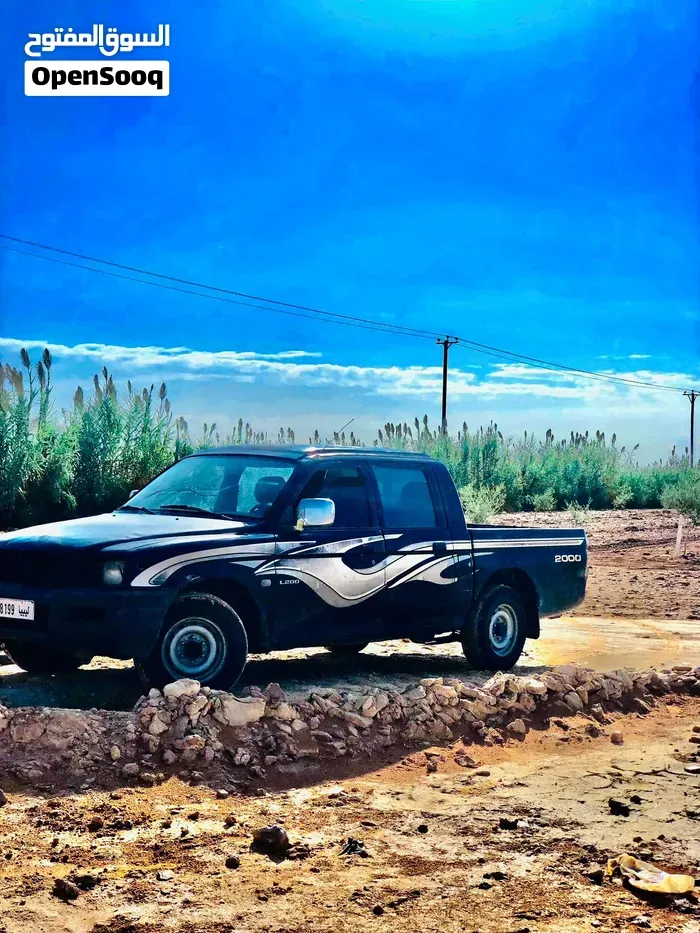 Mitsubishi L200 2004 photo 2