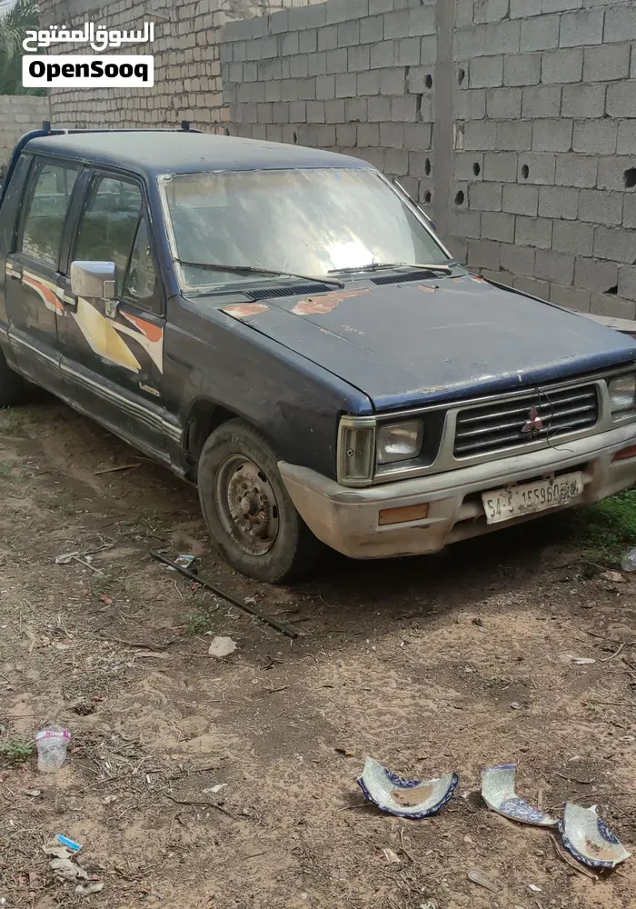 Mitsubishi L200 1997 photo 4