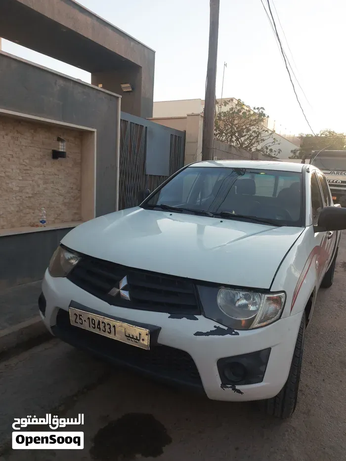 Mitsubishi L200 2010 photo 4
