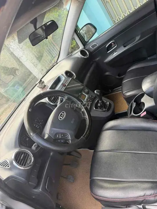 Kia Carens 2010 photo 2