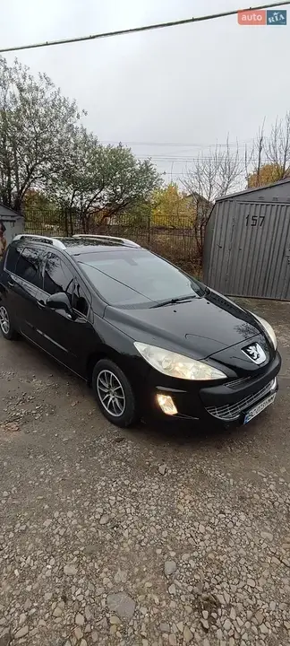 Peugeot 308 2009 photo 2