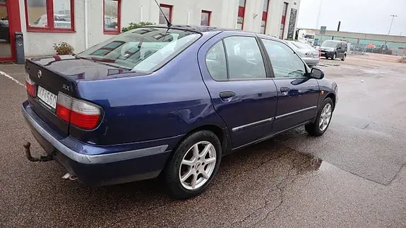 Nissan Primera 1998 photo 4
