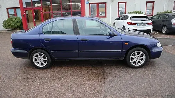 Nissan Primera 1998 photo 3