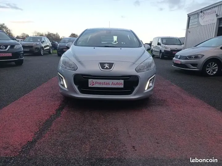 Peugeot 308 2013 photo 2