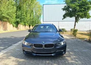 BMW 318D Touring 2013 photo 2