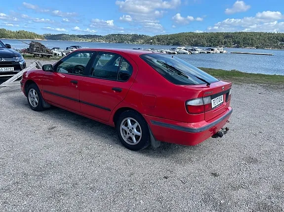 Nissan Primera 1996 photo 4