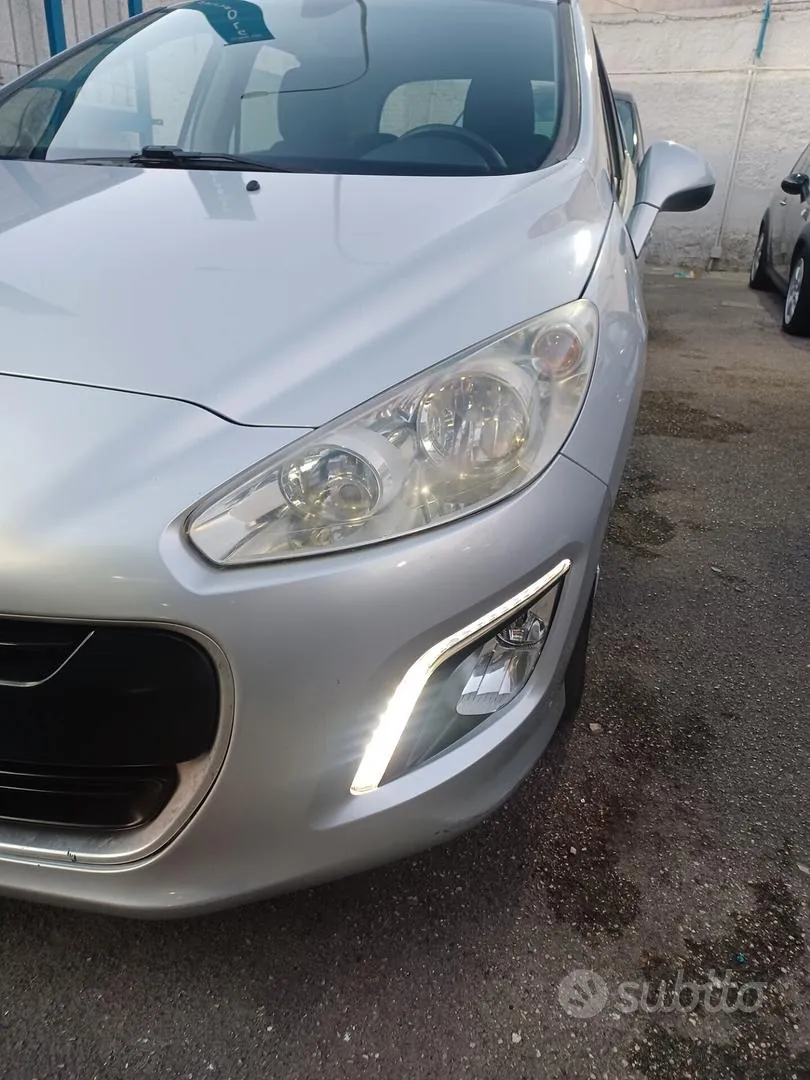 Peugeot 308 2013 photo 5