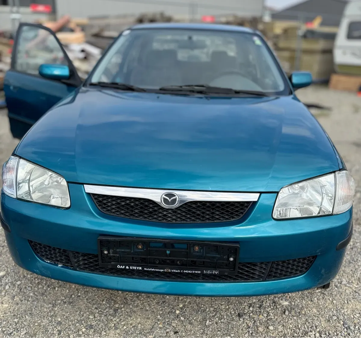Mazda 323 1998 photo 2