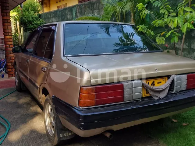 Nissan B11 1984 photo 3