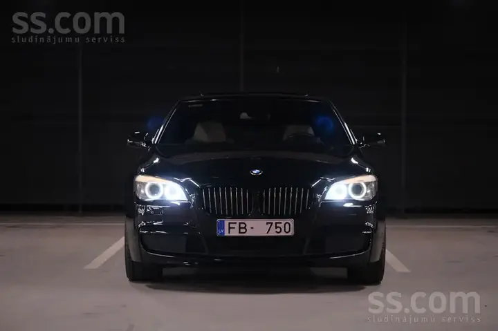 BMW 740D 2010 photo 3