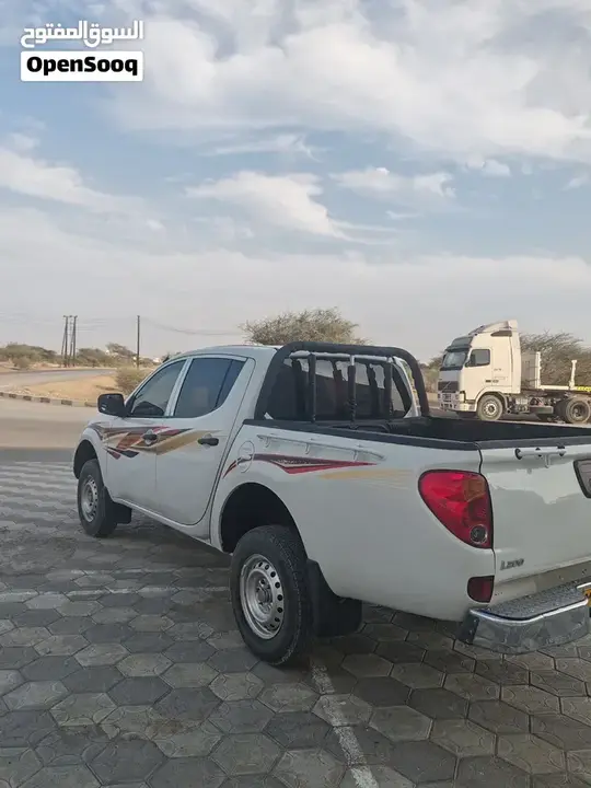 Mitsubishi L200 2012 photo 4