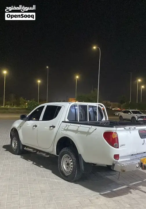 Mitsubishi L200 2012 photo 5