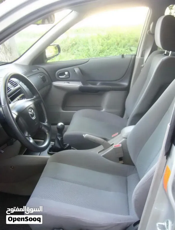 Mazda 323 2001 photo 4