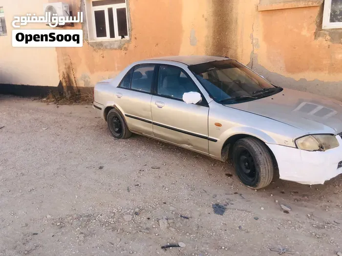 Mazda 323 2000 photo 3