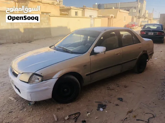 Mazda 323 2000 photo 4