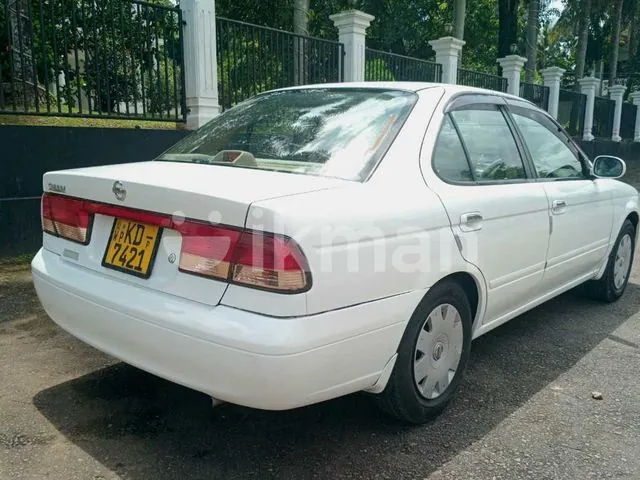 Nissan Sunny 2003 photo 4