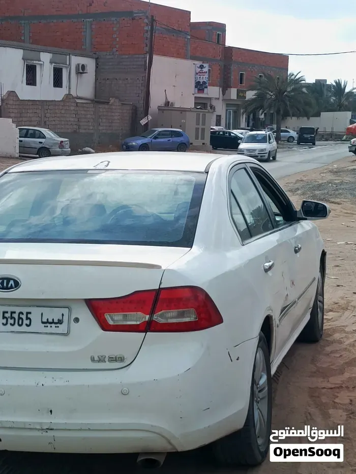 Kia K5 2010 photo 2
