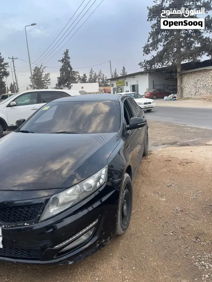 Kia K5 2010 photo 5