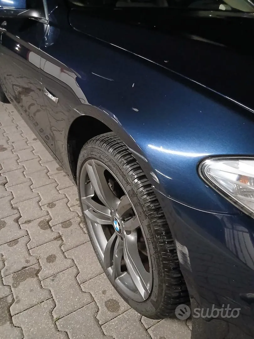BMW F11 2013 photo 5