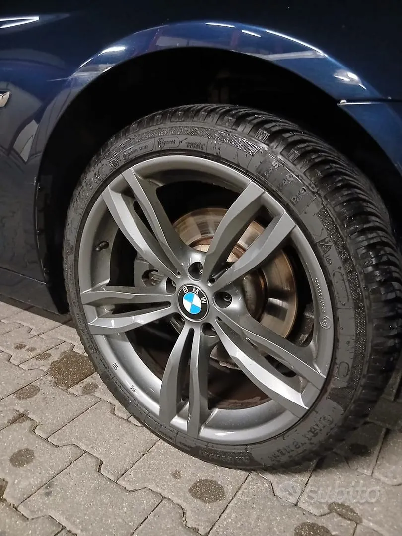 BMW F11 2013 photo 4