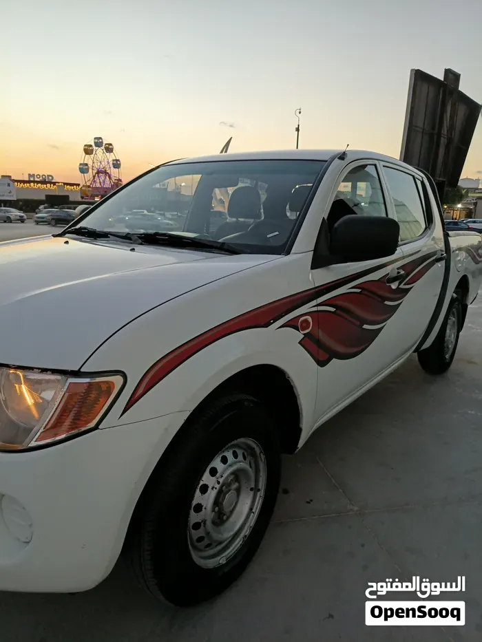 Mitsubishi L200 2008 photo 2