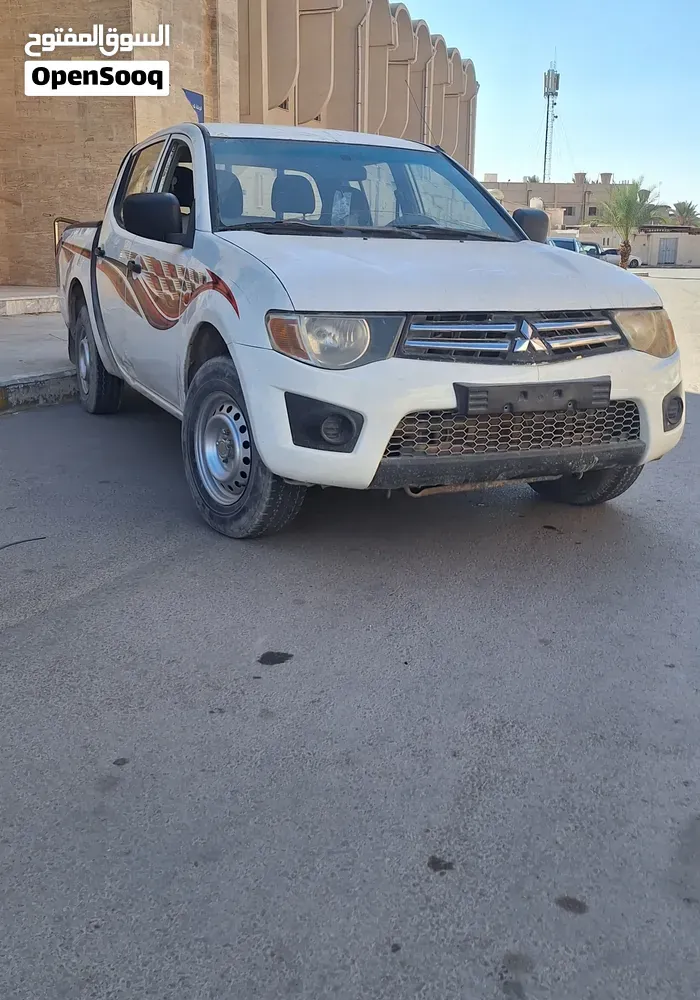 Mitsubishi L200 2008 photo 3