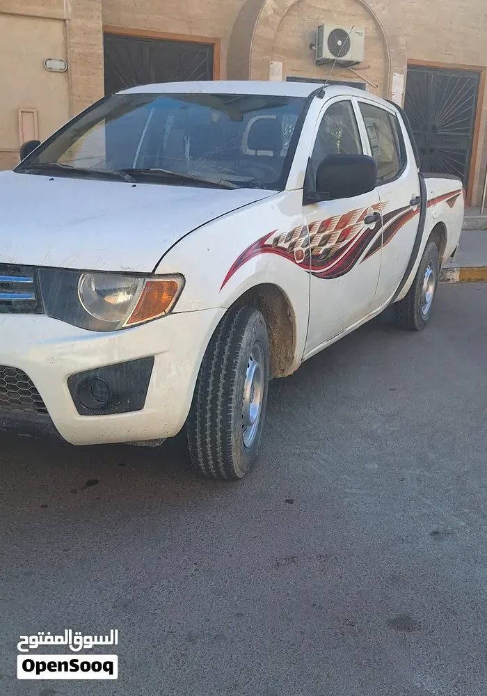 Mitsubishi L200 2008 photo 2