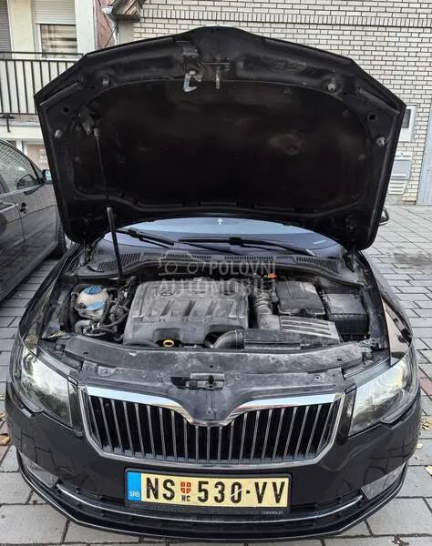 Skoda Superb 2014 photo 4