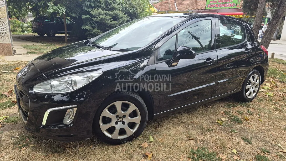Peugeot 308 2012 photo 2