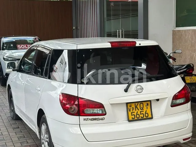 Nissan Wingroad 2007 photo 4