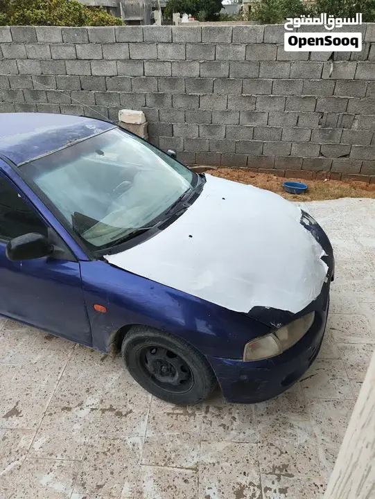 Mitsubishi Colt 1996 photo 2
