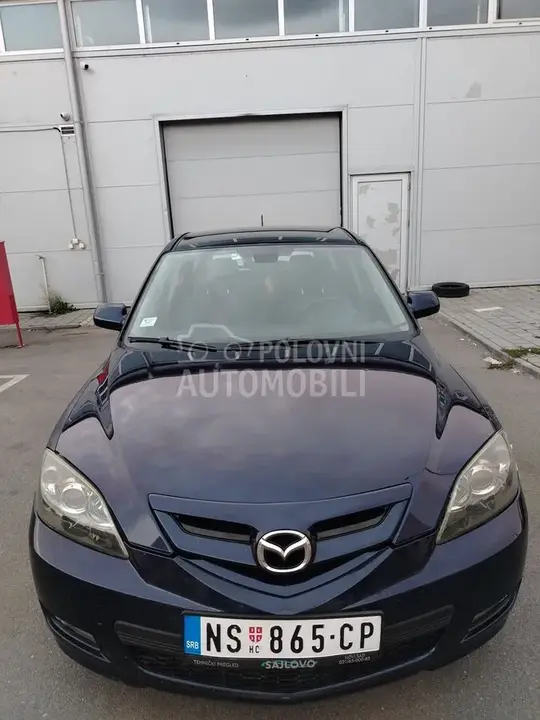 Mazda 3 2009 photo 3