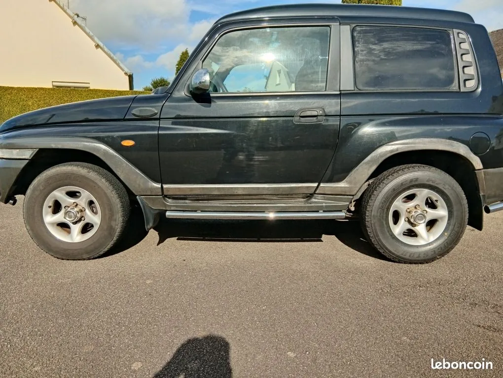 KG Mobility Korando 2002 photo 4