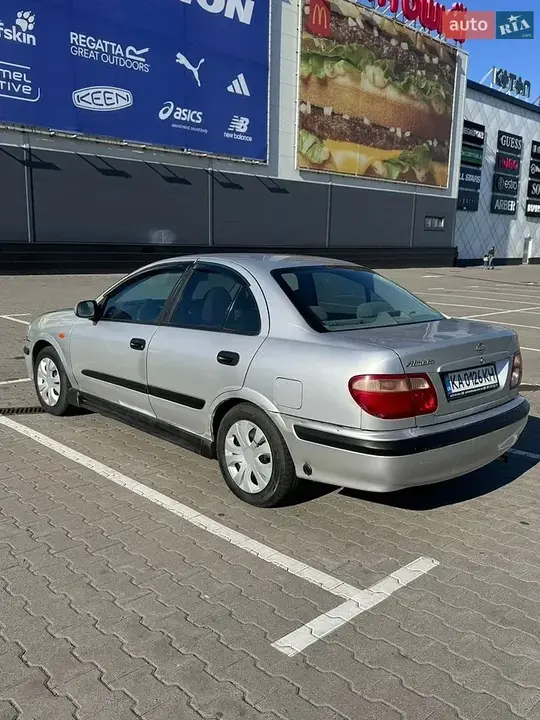 Nissan Almera 2002 photo 3