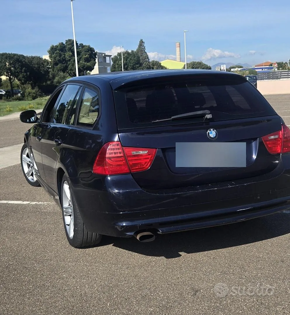 BMW 318D Touring 2009 photo 3