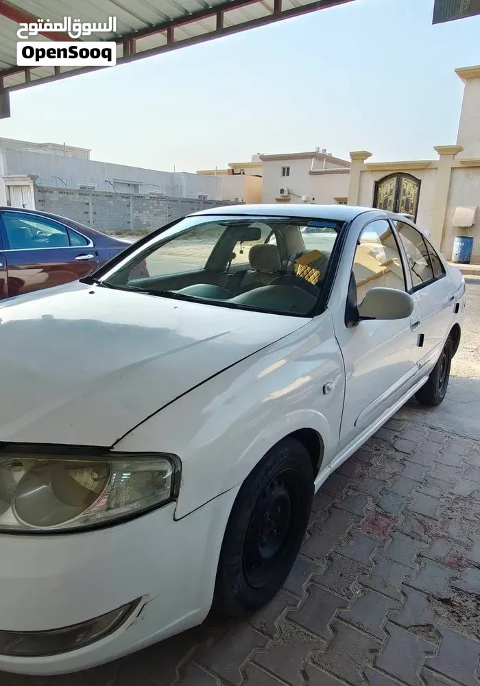 Nissan Sunny 2012 photo 4