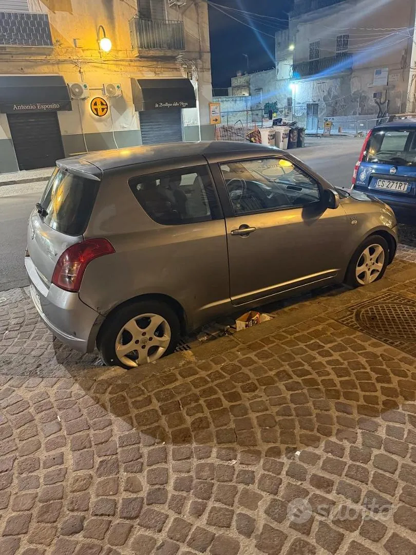 Suzuki Swift 2005 photo 2