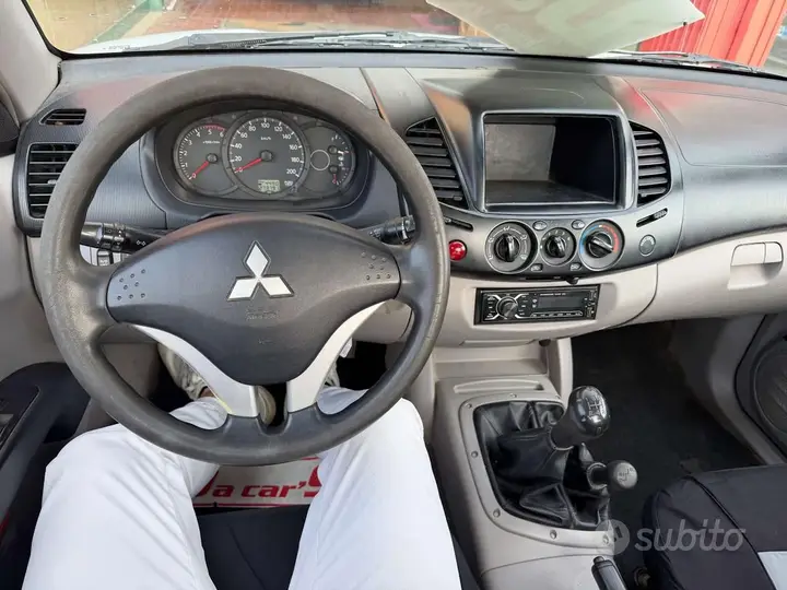 Mitsubishi L200 2013 photo 4