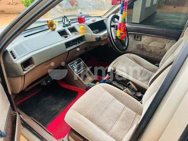 Mitsubishi Lancer 1985 photo 4