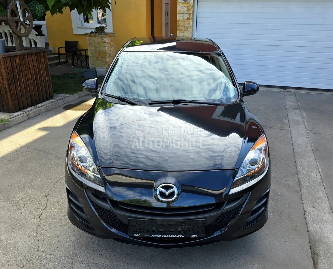 Mazda 3 2009 photo 4