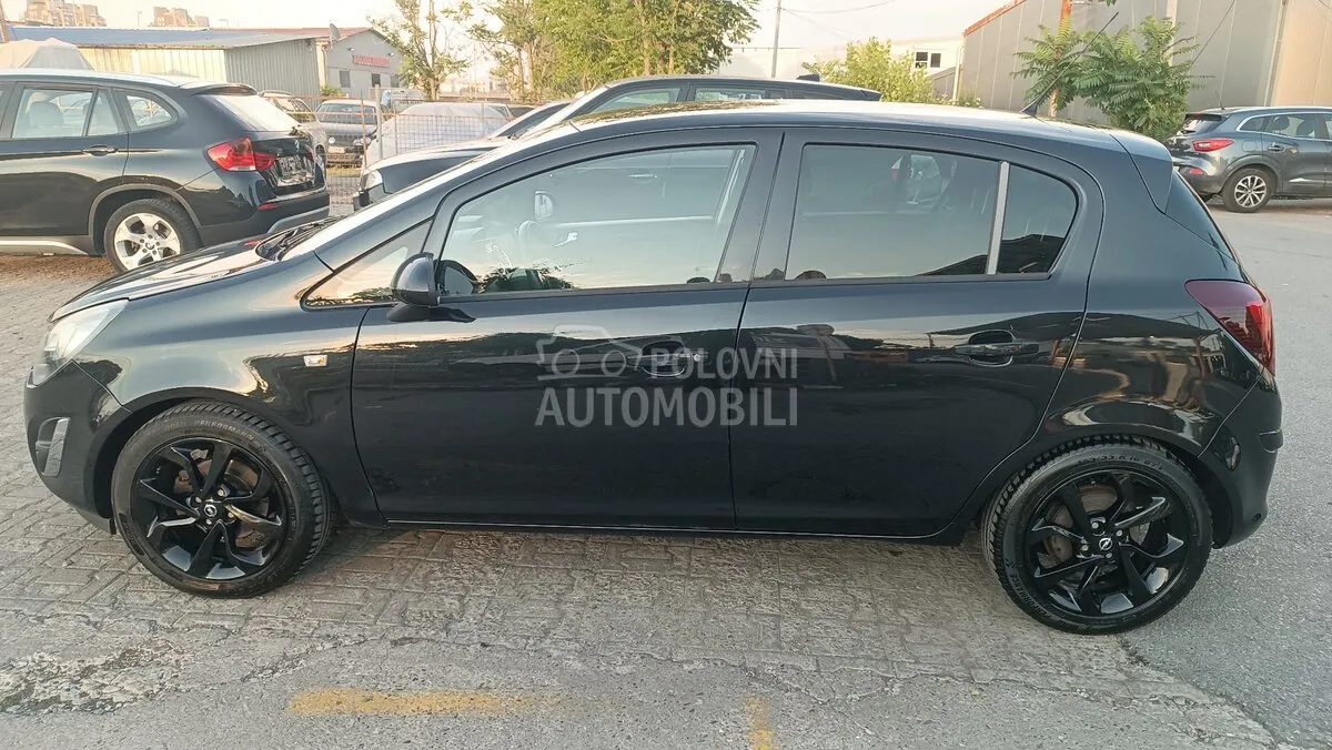 Opel Corsa D 2012 photo 4