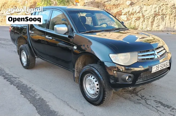 Mitsubishi L200 2015 photo 2