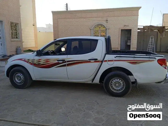 Mitsubishi L200 2009 photo 4