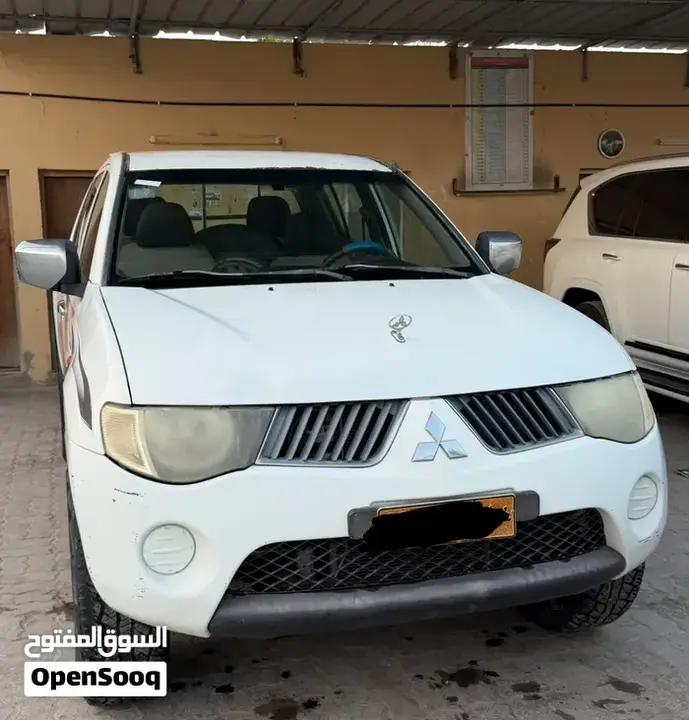 Mitsubishi L200 2009 photo 3
