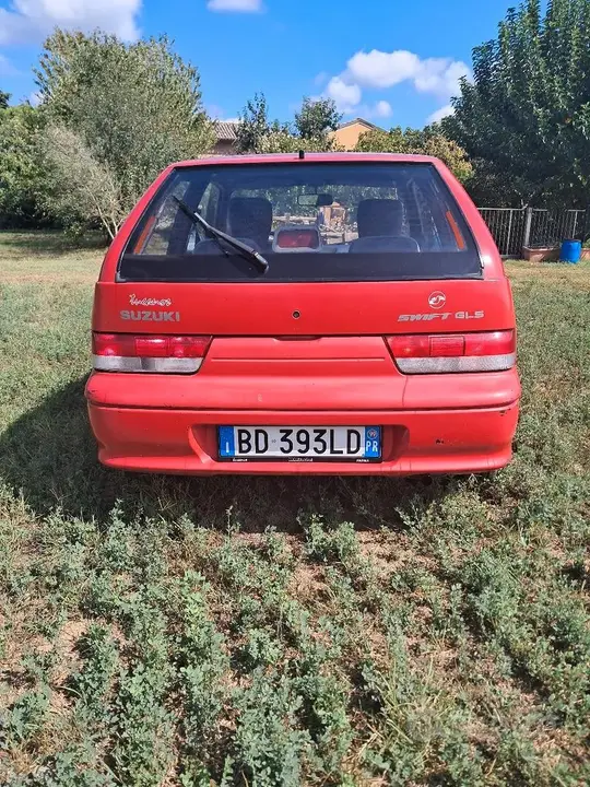 Suzuki Swift 1999 photo 2