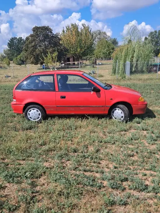 Suzuki Swift 1999 photo 4