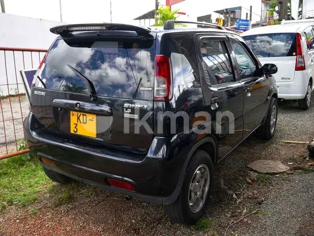 Suzuki Swift 2003 photo 2