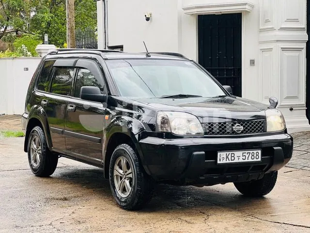 Nissan X-Trail 2003 photo 4